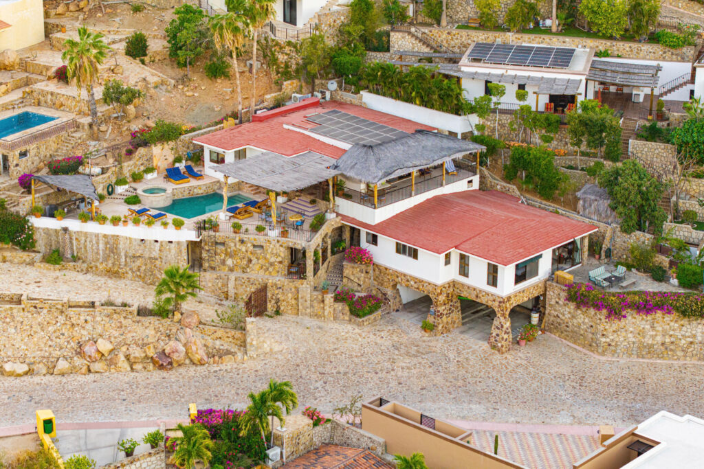 Los Cabos Luxury Pedregal Csl Villa Felicidad is a 5-bedroom, 5.5-bath residence in Pedregal that combines scale, location, and proven income potential. Set just minutes from the main gate and within walking distance to the marina, it offers effortless access to Cabo's best dining and nightlife while maintaining privacy. The home features a private pool, expansive terraces, and panoramic marina – 25 Camino Grande Pedregal, Cabo San Lucas, BS