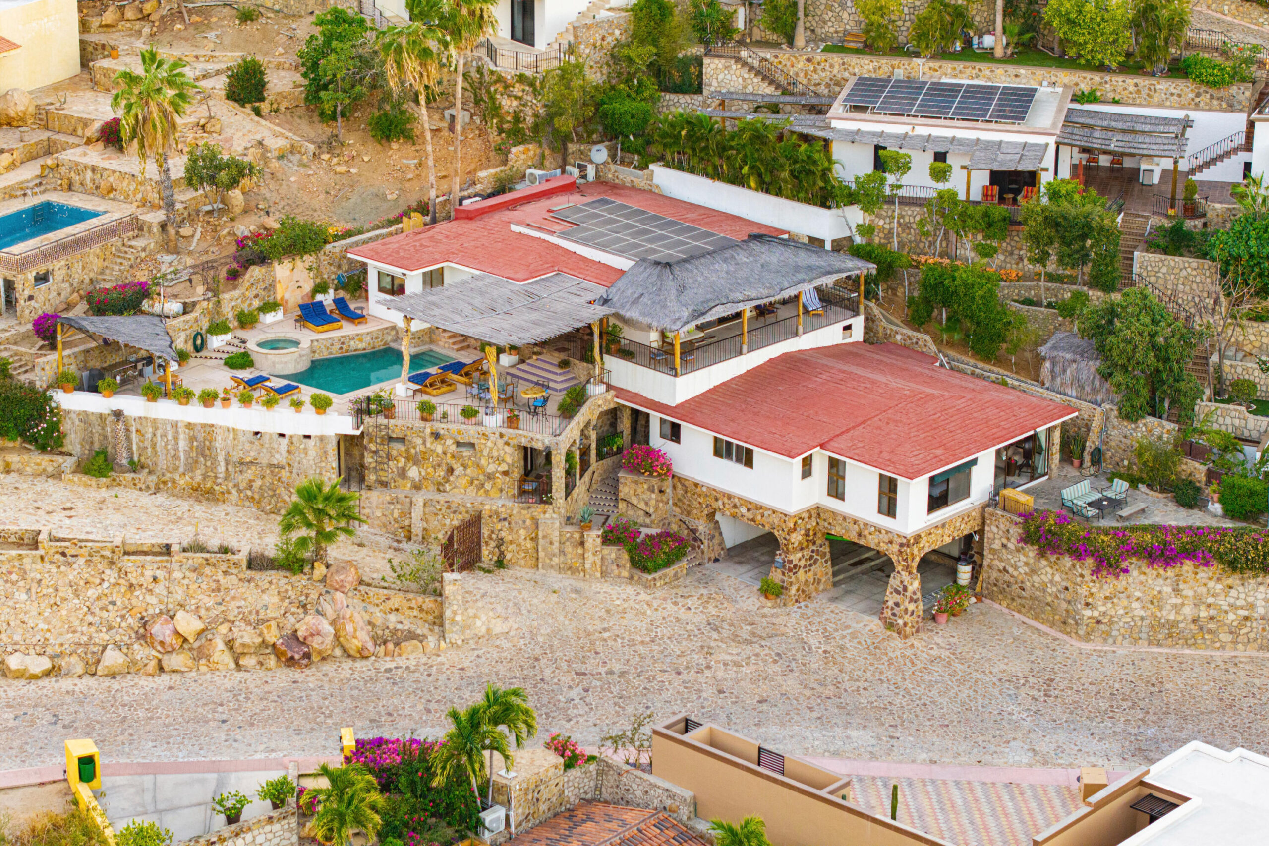 Los Cabos Luxury Pedregal Csl Villa Felicidad is a 5-bedroom, 5.5-bath residence in Pedregal that combines scale, location, and proven income potential. Set just minutes from the main gate and within walking distance to the marina, it offers effortless access to Cabo's best dining and nightlife while maintaining privacy. The home features a private pool, expansive terraces, and panoramic marina for sale