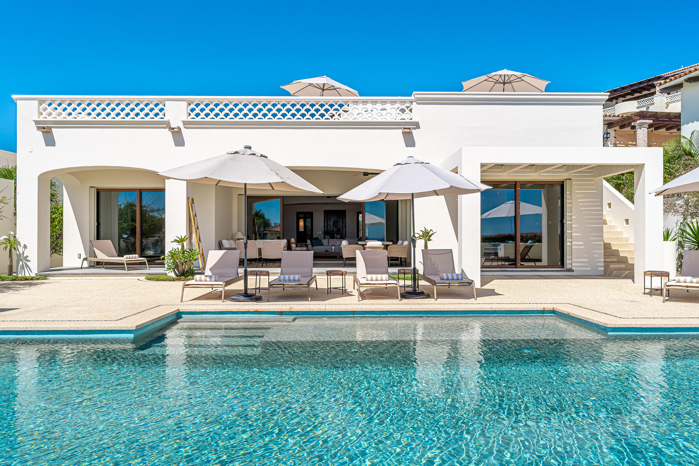 Los Cabos Luxury Las Terrazas Set along the 15th hole of the El Cardonal Golf Course, panoramic vistas extend from rolling fairways to the Pacific, delivering striking sunrises and sunsets.This four-bedroom, 4.5-bath home blends refined design with seamless indoor-outdoor living. Open-concept interiors feature Palecek furnishings, while each bathroom showcases hand-painted Mexican tile for warmth and authenticity.Outdoor living includes a private pool and elevated hot tub, outdoor grill and wet bar, lush landscaping, and expansive terraces with golf course and ocean for sale