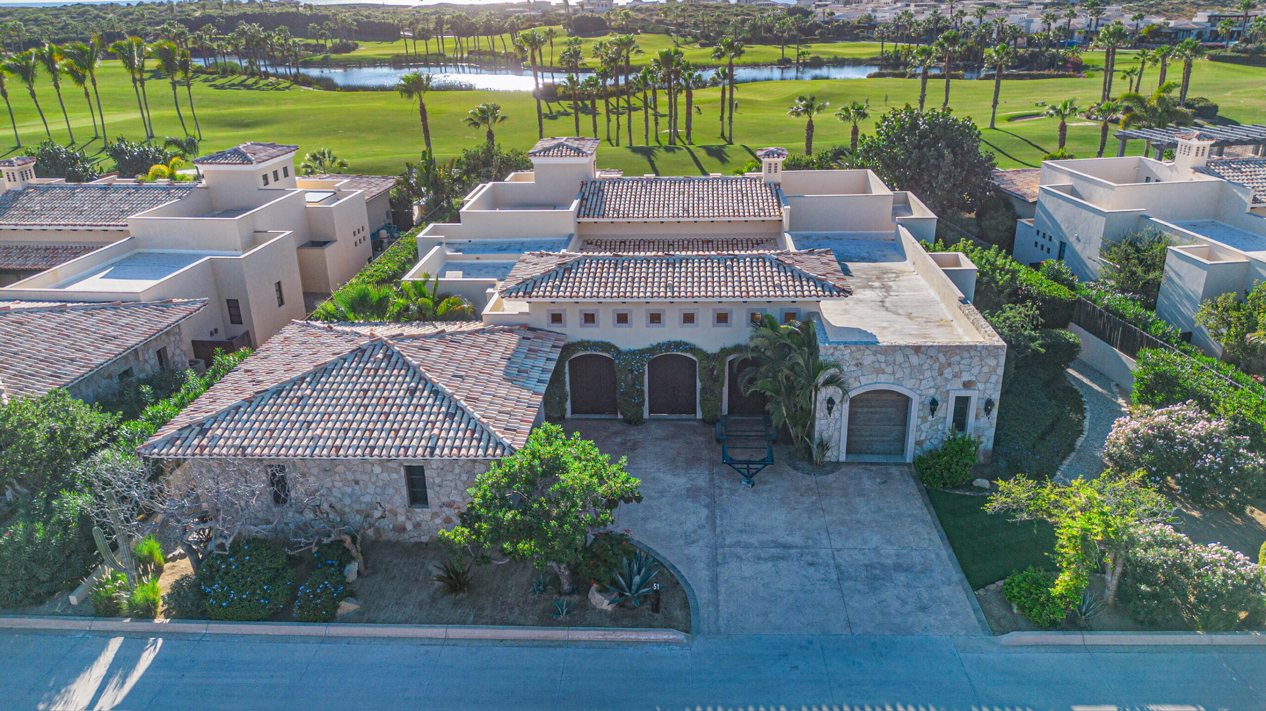 Los Cabos Luxury Golf Villas Set along the lush Bermuda fairways of the Tiger Woods-designed Oasis Short Course, this exceptional five-bedroom hacienda-style residence blends classic Mexican architecture with refined contemporary luxury. A grand central courtyard opens to an expansive great room that flows seamlessly to a private terrace with heated pool, palapa swim-up bar, and fire-pit lounge overlooking the Oasis par-three course. Designed for effortless entertaining, the home features multiple indoor and outdoor living spaces, a gourmet kitchen, and a covered outdoor grill ideal for hosting family and friends. As a Legacy Club home at Diamante Cabo San Lucas, ownership provides access to championship golf, the iconic Crystal Lagoon®, spa, beach club dining, and miles of Pacific coastline. for sale