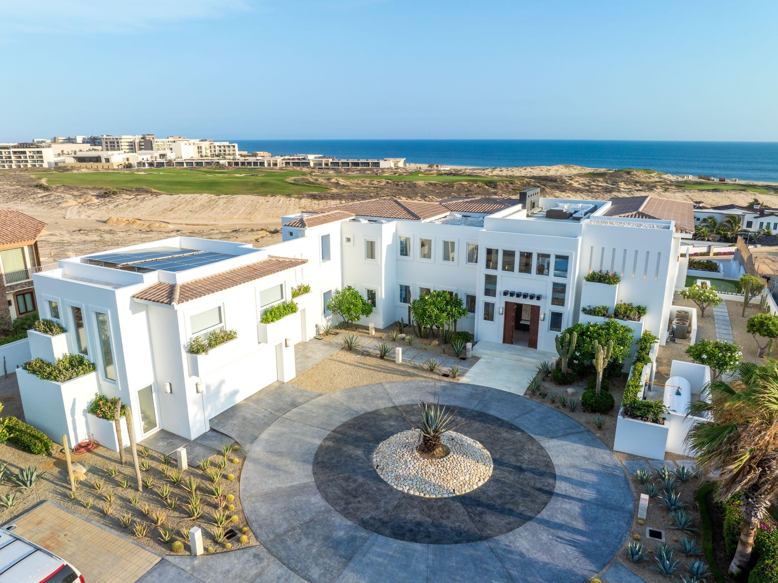 Los Cabos Luxury Beach Estates Luz de Diamante is perfectly situated just a short walk from the beach and nestled within the prestigious Diamante community positioned between the 5th and 16th holes of the Dunes Course designed by Davis Love III. Spanning approximately 20,000 sqft, this magnificent residence, built in 2017, seamlessly blends modern design with Mexican accents. The estate boasts four spacious master bedrooms, each providing stunning ocean for sale