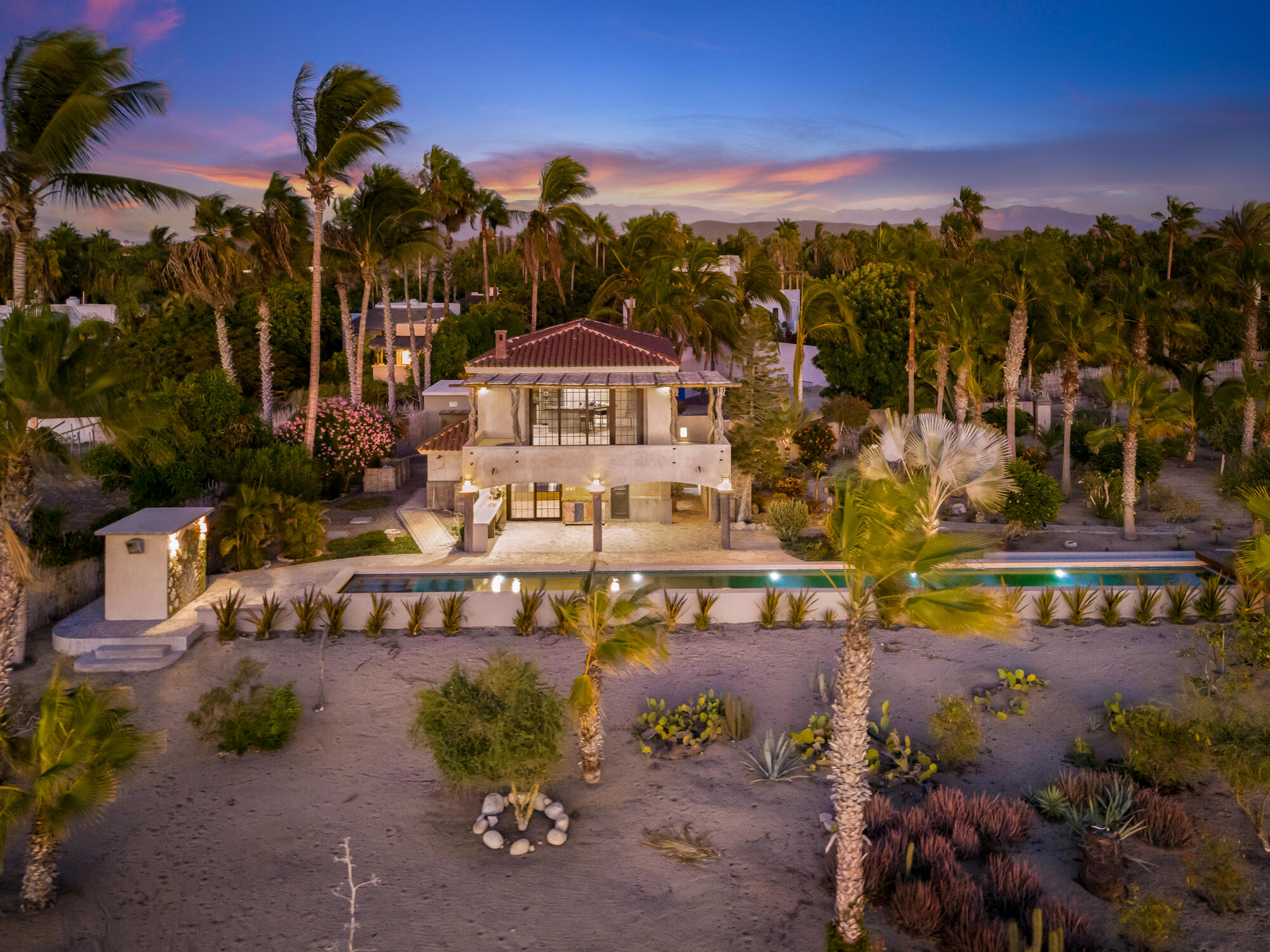 Los Cabos Luxury La Cachora This is the best beachfront property in the most affluent community in Todos Santos, La Cachora. This neighborhood boasts robust vegetation due to its proximity to the La Poza estuary. This property could be a remote end-of-road estate or as a development hub. Referring to for sale