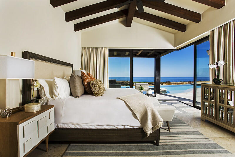 Los Cabos Luxury La Canada Experience unparalleled luxury in this exquisite modern residence, located in the prestigious Club Campestre Golf Club community of Los Cabos, Mexico. Boasting 5,242.02 sq. ft. of thoughtfully designed living space, this home offers four spacious bedrooms, each with its own en-suite bathroom, and two additional half-bathrooms for added convenience. High ceilings create an open, airy ambiance, while modern stone finishes and fine custom carpentry enhance the home's sophisticated aesthetic.The fully equipped kitchen is a culinary masterpiece, featuring state-of-the-art appliances from Sub-Zero, Wolf, and Bertazzoni. For added functionality, an additional working kitchen is included, making this home ideal for entertaining. From the interior, breathtaking ocean and golf course for sale