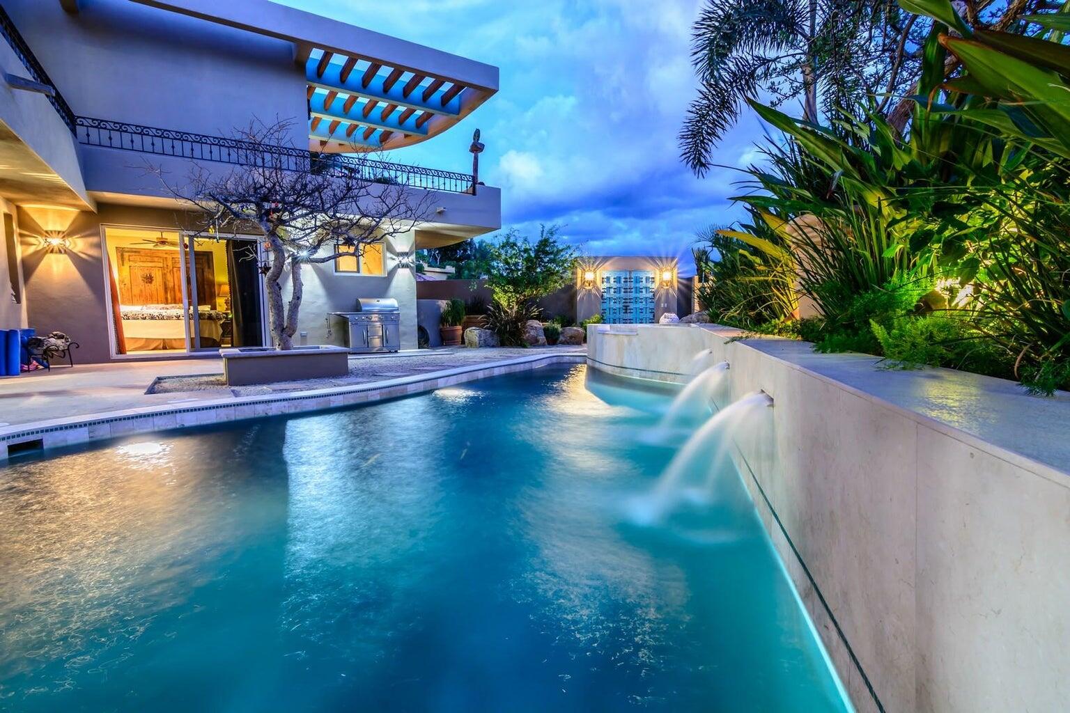 Los Cabos Luxury Pedregal Csl Tucked into the lush mountains of Pedregal, this residence offers rare privacy, land value, and untapped potential. Its standout feature is the expansive green zone beside the pool--a true rarity in Pedregal, where landscaping and usable outdoor space significantly elevate long-term value. This alone positions the property as a compelling investment. The home includes four bedrooms with lock-out closets, two separate entrances, a chef's kitchen with GE Monogram appliances and an aqua granite island, plus essentials like a generator and storm shutters. Ocean, hillside, and lush garden for sale