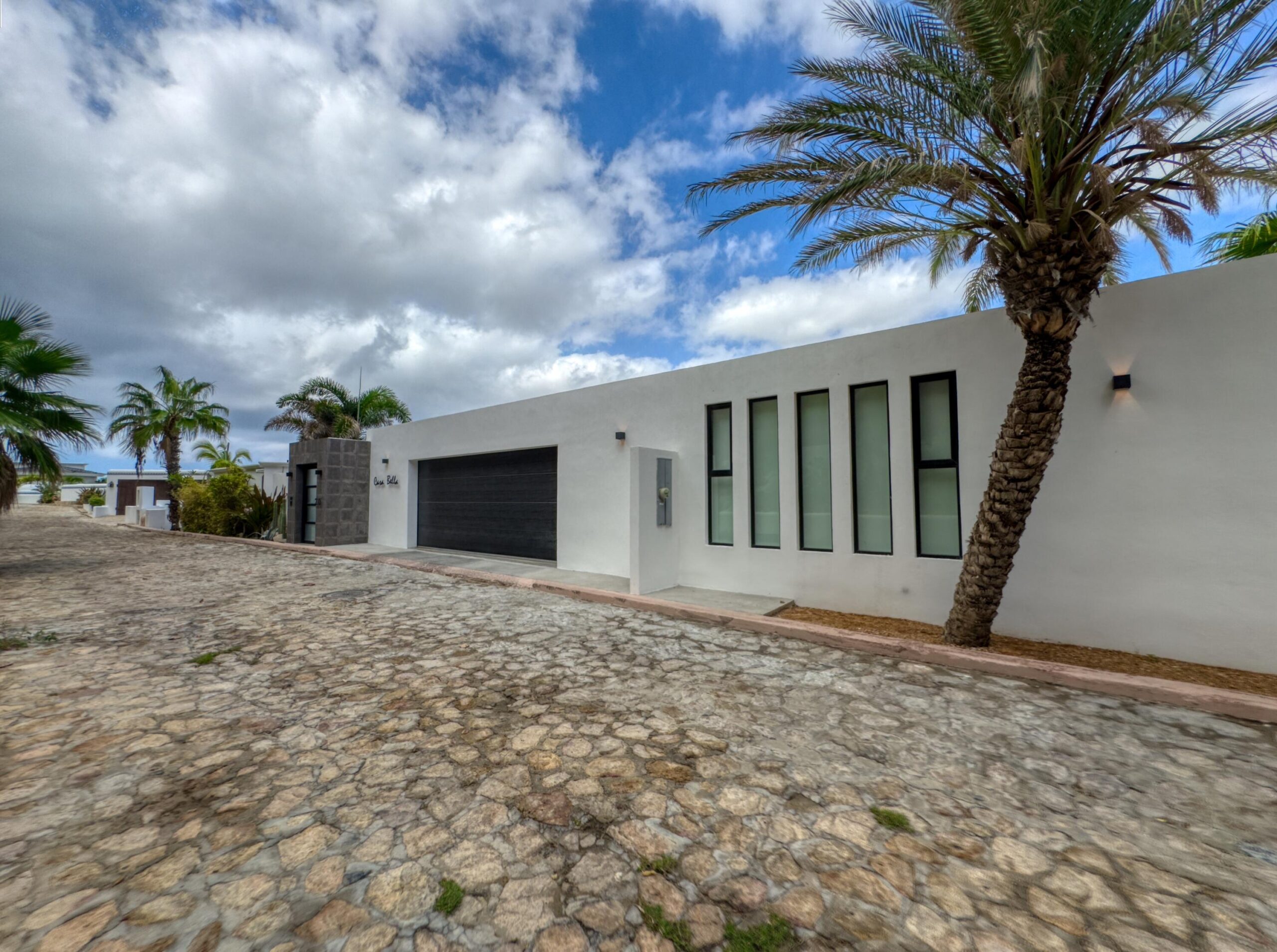 Los Cabos Luxury Pedregal Csl Casa Bella redesigned encompasses a warm modern style combined with abundant lush landscaping.Situated on a large private corner lot with unobstructed oceans for sale