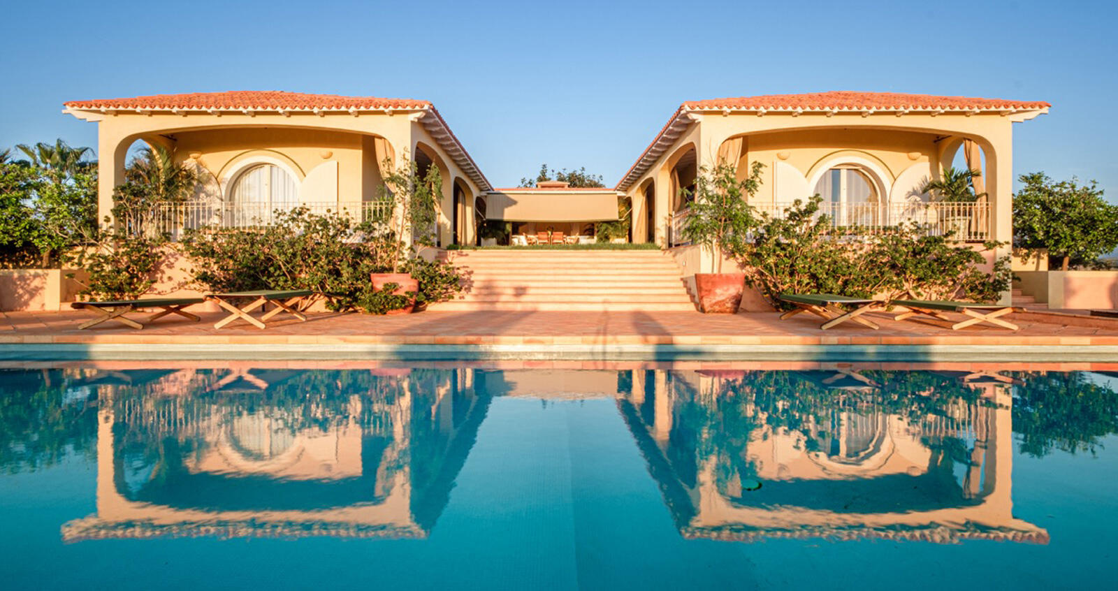 Los Cabos Luxury Todos Santos-General Iconic Mediterranean-style residence nestled in the desert of Baja California Sur. This estate is perfectly suited for a private full-time residence, high-end boutique hotel, luxury vacation rental, or exclusive destination venue. Built to the highest standards, the mansion features double-glazed windows and marine mahogany doors imported from Europe. The interior combines international quality with Mexican craftsmanship, including handmade Saltillo-style mosaics throughout. The gourmet kitchen, equipped with designer appliances and handcrafted tiles, flows seamlessly into a great room and a terrace offering limitless for sale