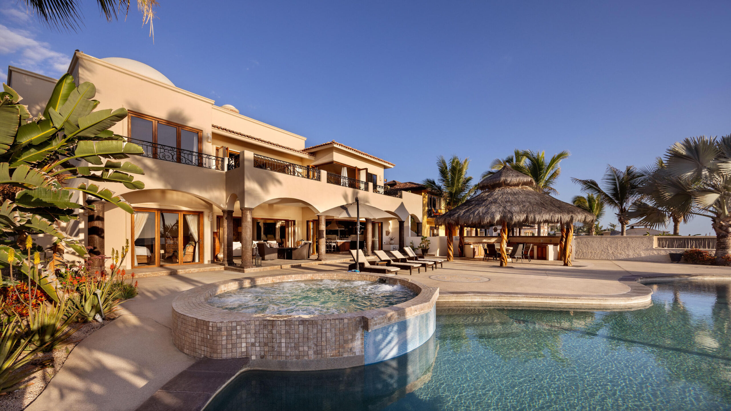 Los Cabos Luxury The Tequila Ranch A Legacy Estate on Baja's Pacific Coast. Set along a rare and pristine stretch of Pacific coastline within the private gates of Tequila Ranch, Hacienda del Pacífico is a grand oceanfront estate that embodies timeless Mexican architecture, refined craftsmanship, and the quiet power of Baja's untamed shore.Designed in the tradition of Mexico's great coastal haciendas, this expansive residence offers four private main suites, each thoughtfully positioned for privacy, comfort, and sweeping for sale