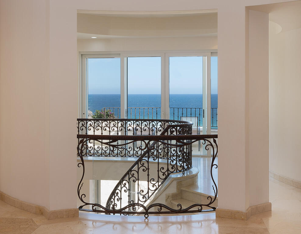 Los Cabos Luxury Pedregal Csl Villa Marcella sits on an exquisite piece of ocean front property in the exclusive community of Pedregal in Cabo San Lucas. This 6 bedroom 9 bathroom beach estate has a very private location with it's natural mountainside to it's left that make it perfect for entertaining large beach parties, family gatherings, it has even been known to host quite a few a weddings. The beach estate consists of outdoor fire pit, Olympic size swimming pool, jacuzzi, outdoor cooking area, indoor game and bar room accessible from the beach. Enjoy the long beach walks and beautiful Pacific sunrises and sunsets from this beach home. Excellent INVESTMENT property or private home on the beach. for sale