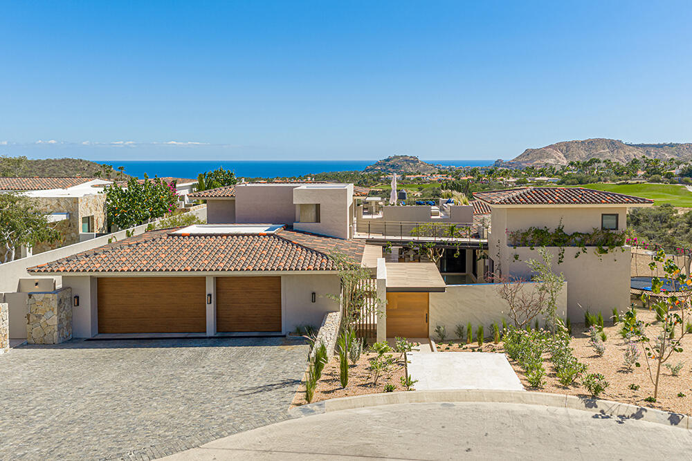 Los Cabos Luxury Section 22f- La Montana Set within the prestigious private community of Querencia, this striking contemporary estate sits on a 19,407 sq ft homesite and offers approximately 8,600 sq ft of refined indoor-outdoor living. Enjoy panoramic ocean for sale