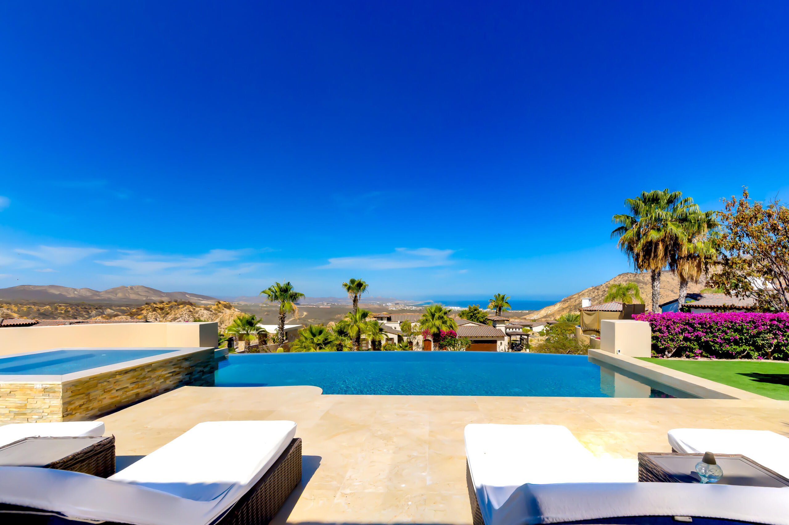 Los Cabos Luxury Section 4- Las Canadas Discover refined indoor-outdoor living at Cañada 9, set within Querencia, San Jose del Cabo's premier private golf community. Soaring beamed ceilings, walls of pocket glass, and luminous marble floors define an open great room that flows effortlessly to the terrace, infinity-edge pool, and stone-clad water feature -- all framed by panoramic Sea of Cortez and mountain for sale
