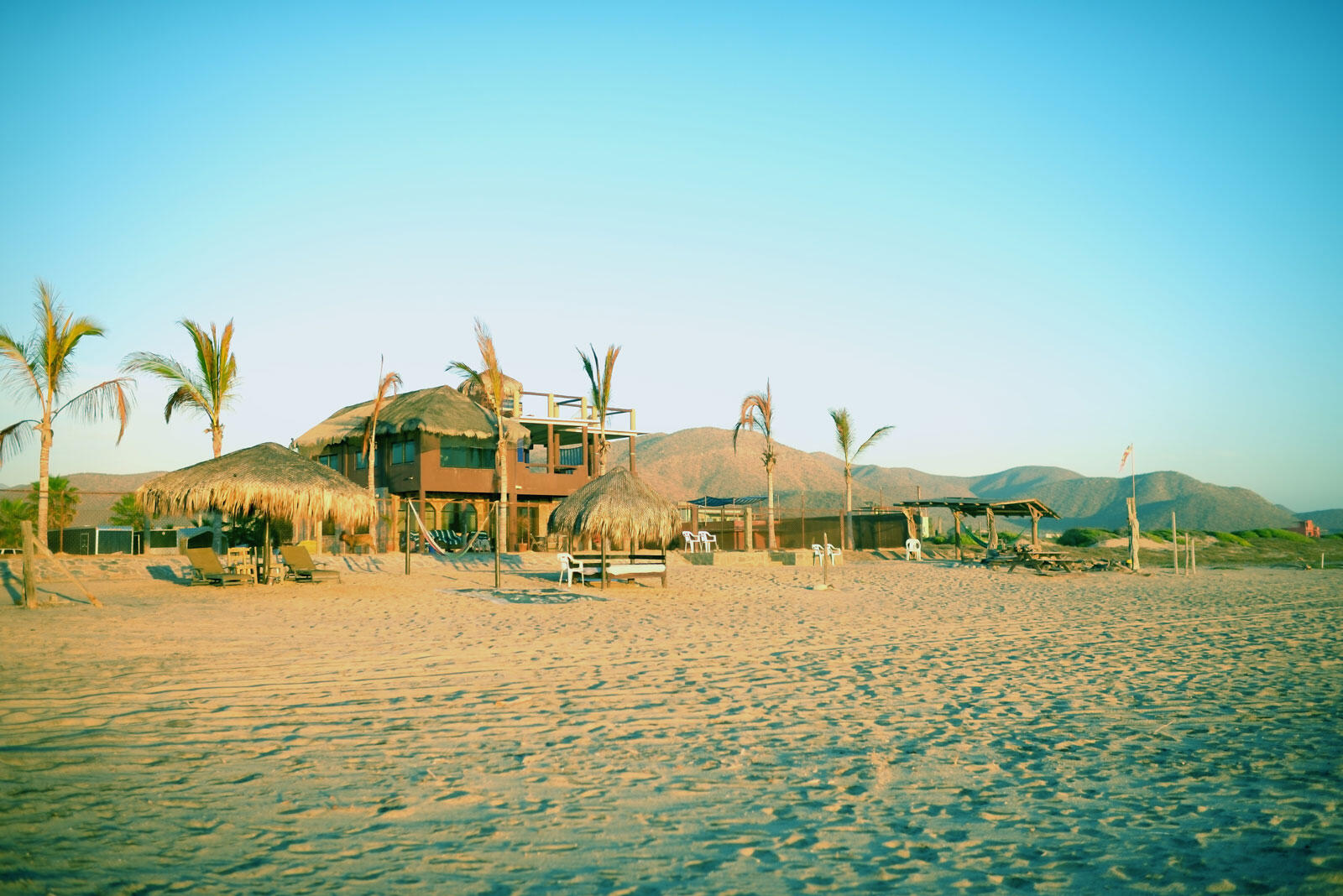 Los Cabos Luxury Cerritos For sale: A remarkable property in South Cerritos Beach. Spanning an impressive 3,470 m2, this lot includes two buildings with eight units, each adorned with traditional palapa roofs. The owner has meticulously prepared and enhanced the land, creating a level and expansive area extending towards the beachfront. This unique offering presents limitless potential, suitable for a family compound. The property is entirely self-sustaining, equipped with solar panels, water cistern, and septic systems, ensuring a harmonious blend with its natural surroundings. Located just 1.5 miles from the main surf break and in close proximity to local restaurants, this is an exceptional opportunity for those seeking a blend of tranquility and accessibility. for sale