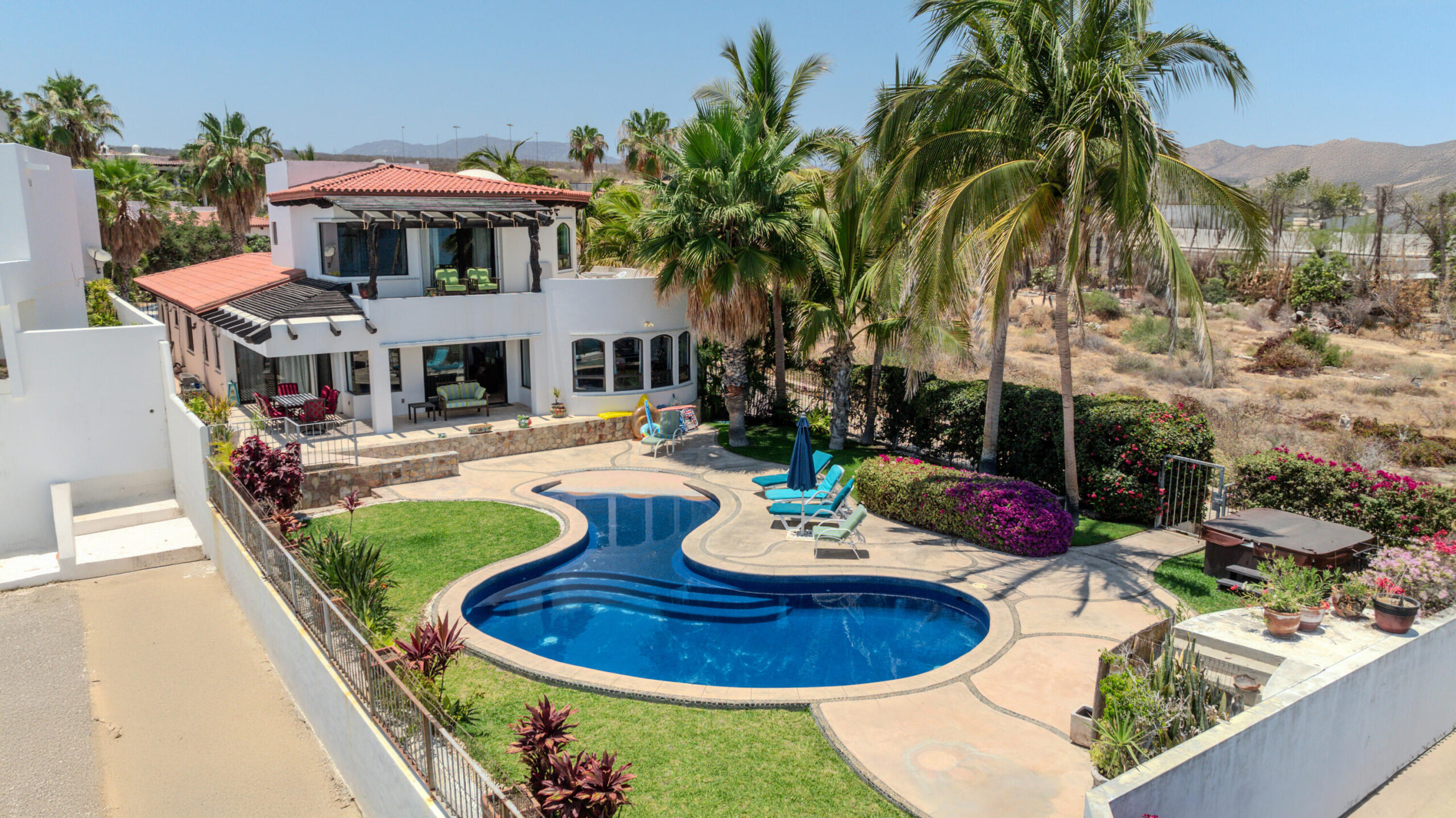 Los Cabos Luxury Playa Del Rey HUGE PROFT OPPORTUNITY to own the former cabo oasis of the red hot chili peppers (WATCH THE NEW NETFLIX DOC HERE cope and paste-(https://www.youtube.com/watch?v=Exs7-tOaQQY)---above a swimming/snorkel beach, currently generating a steady consistent income that outperforms others, due the former red hot chili pepper history and art. Hidden inside the double gated waterfront enclave above a a spanning beach and ocean cove, this aptly named estate awaits-just minutes to a long list of spoils. Covering nearly 6000 square feet, this triple-height foyer, opens into a grand spanning living and dining space layered in natural stone, marble and musical art throughout. Additional add-ons include: St Tropez themed exterior spaces, rooftop lounge, fire bowls and fire pits, added steam sauna and mor for sale