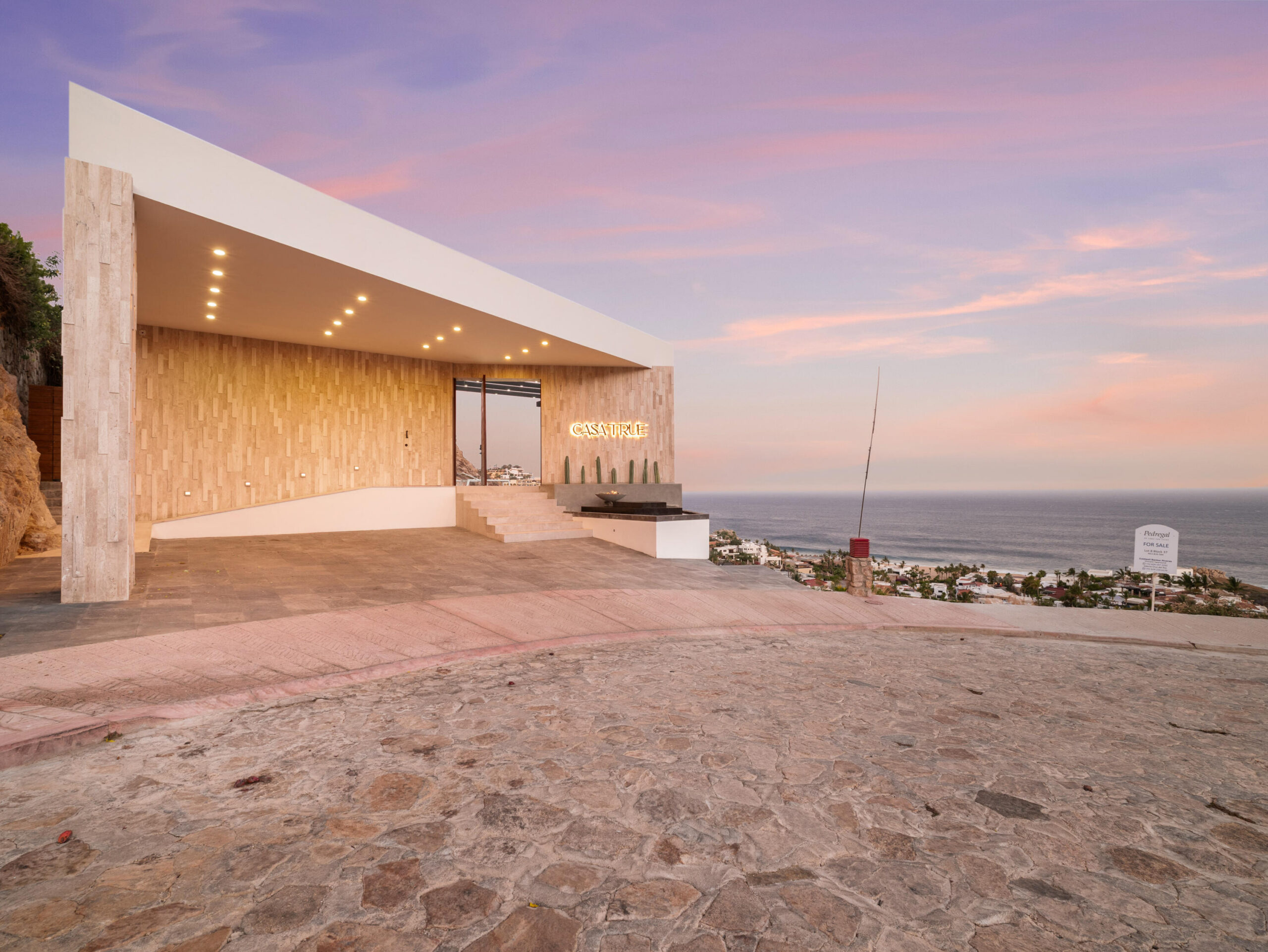 Los Cabos Luxury Pedregal Csl Where the Pacific Becomes Your BackyardSome homes simply house you. This one transforms you.Perched in the coveted enclave of Pedregal -- Cabo San Lucas's most prestigious address -- this five-bedroom, six-and-a-half-bathroom estate is not just a property. It's a declaration. A fully furnished masterpiece where every room was designed with a single purpose: to make you feel like the most important person in the world, because here, you are.Step inside and the ocean doesn't just greet you -- it commands the room. A sweeping open-frame window turns the Sea of Cortez into living art, framed by handcrafted parota wood furniture that brings warmth, soul, and a sense of timeless Mexican craftsmanship to every gathering. Sunsets here aren't something you watch. They're something you host. The smart bedrooms offer panoramic ocean for sale