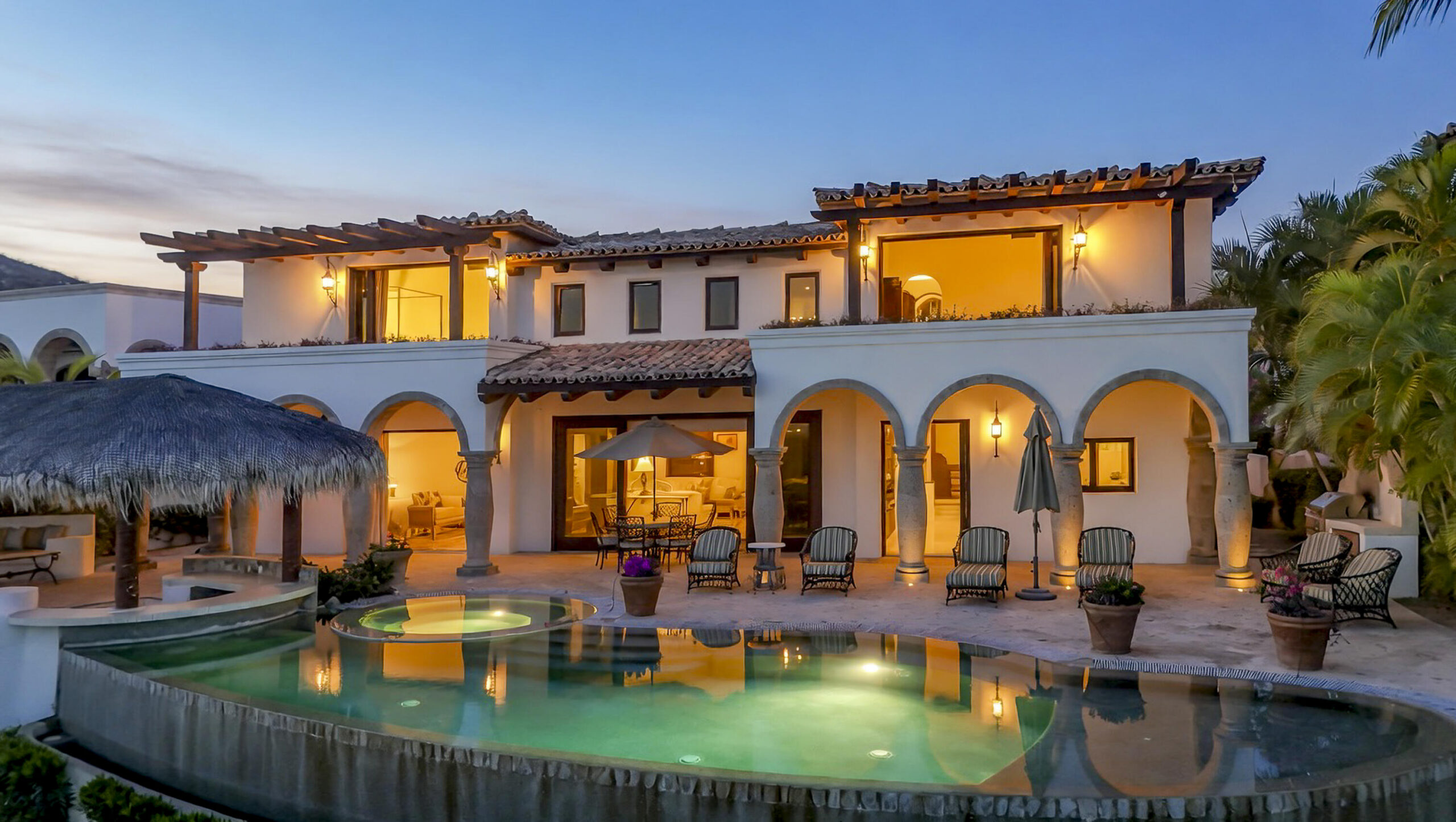 Los Cabos Luxury Section 18- Horizontes Welcome to Horizontes 3, an exquisite custom-made home located within San José del Cabo's most sought-after community, Querencia. Surrounded by Tom Fazio's signature golf course, recognized as one of the best in the country, this stunning residence is just a short golf cart ride from the prestigious 5-star Club House. This remarkable 6-bedroom, 6.5-bathroom home elevates luxury living with a fresh vision of architecture and design. The layout features a cozy family room, an expansive bunk bed bedroom on the lower level, and a spacious maid's quarters with an independent entrance, making it ideal for entertaining family and friends.The property boasts outdoor living spaces, including tranquil green areas, an outdoor kitchen, an infinity pool, a jacuzzi, and ocean and ravine for sale